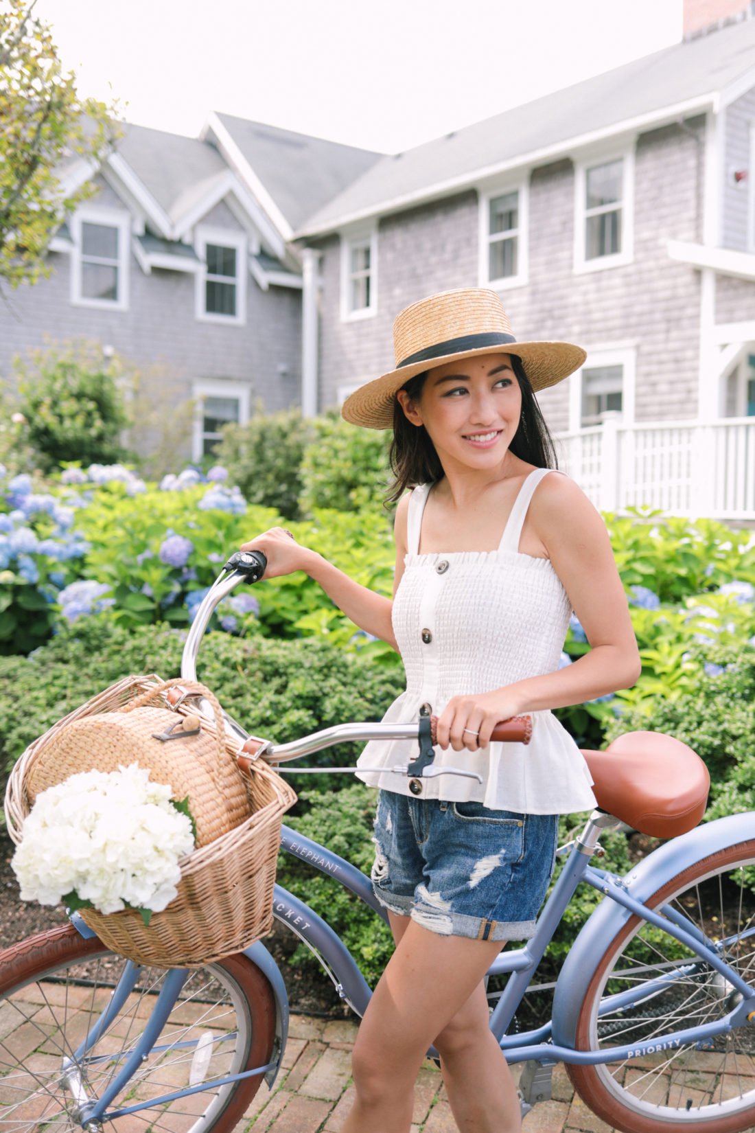 cape cod bike vacation outfit janessa leone klint boater hat