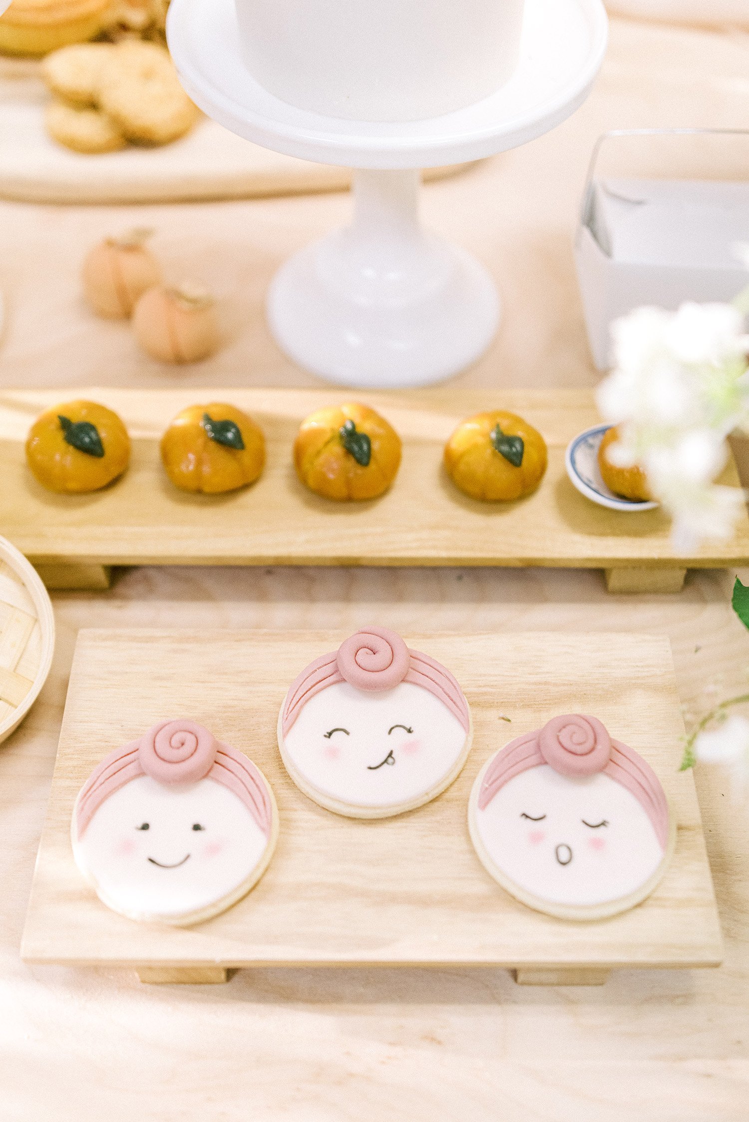 baby girl topknots birthday cookies